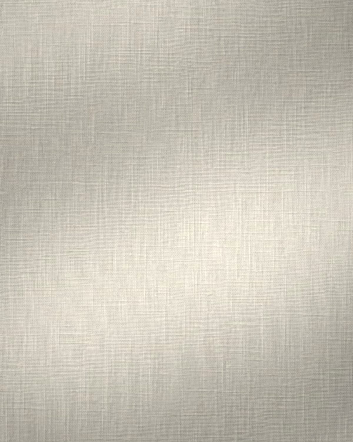 Close-up of stiff white woven cotton interlining under side light